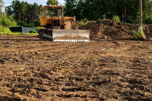 excavator-clearing-large-piece-of-land-austin-tx