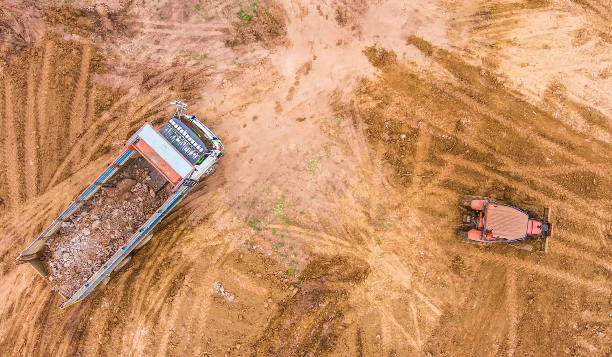 dump truck unloading soil on a construction site austin tx